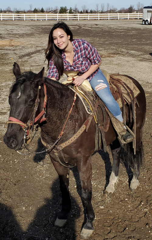 Irene with horse outdoors