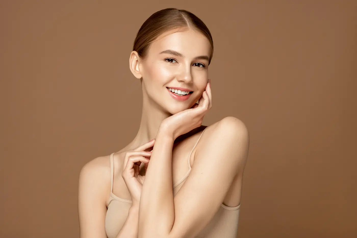 Beautiful young woman with perfect skin